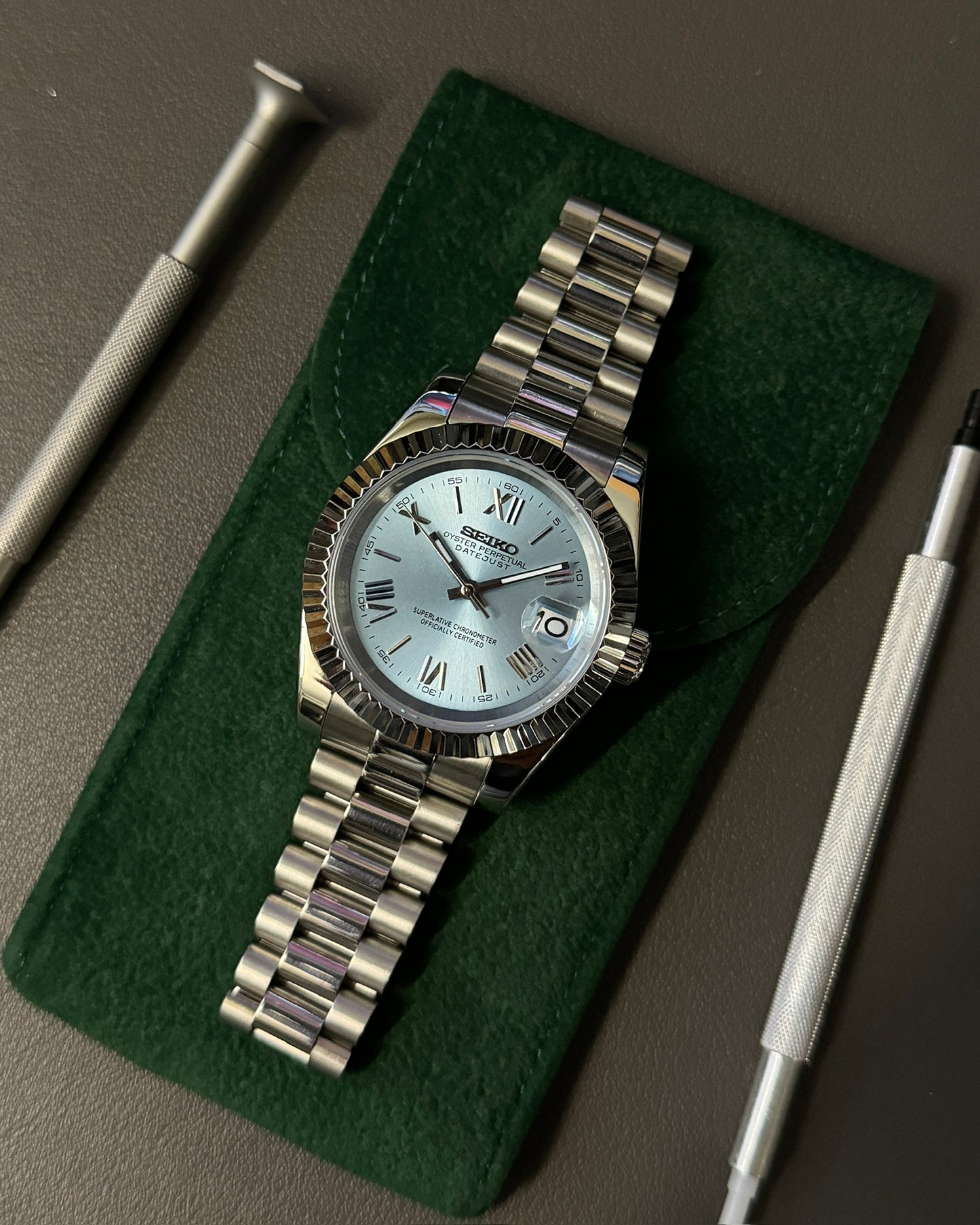 Datejust: Stainless Steel Ice Blue Dial Roman Markers w/ Presidential Bracelet