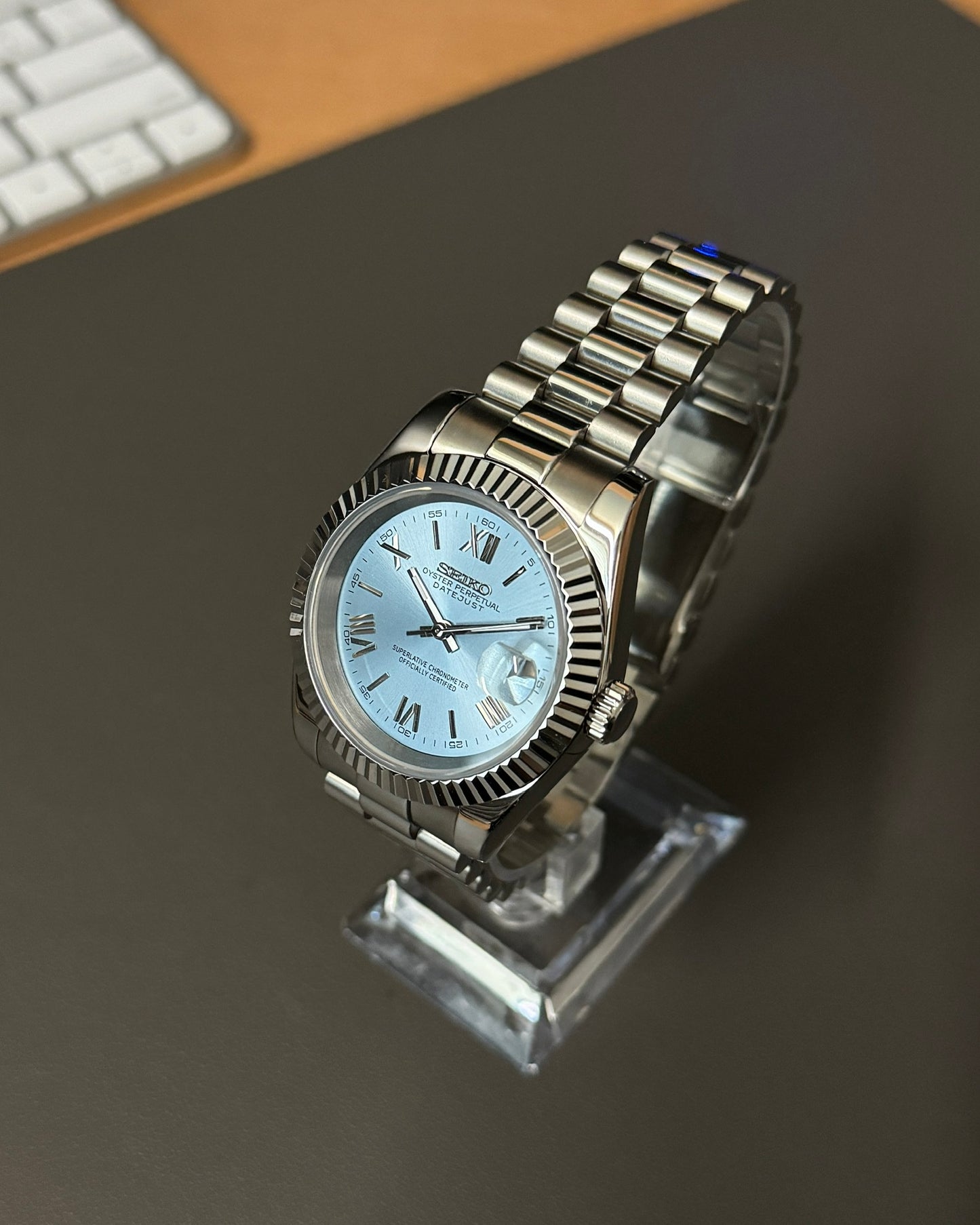 Datejust: Stainless Steel Ice Blue Dial Roman Markers w/ Presidential Bracelet