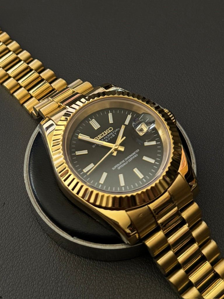 DateJust: Gold Black Dial Stick Markers w/ Presidential Bracelet