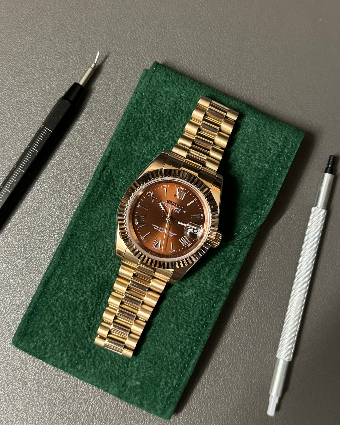 DateJust: Rose Gold Chocolate Dial Roman Numerals Fluted Bezel on Presidential Bracelet