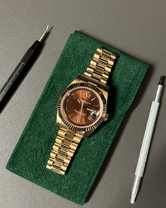 DateJust: Rose Gold Chocolate Dial Roman Numerals Fluted Bezel on Presidential Bracelet