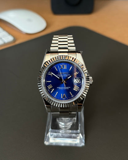 Seiko Mod DateJust: Stainless Steel Blue Dial Roman Markers w/ Presidential Bracelet