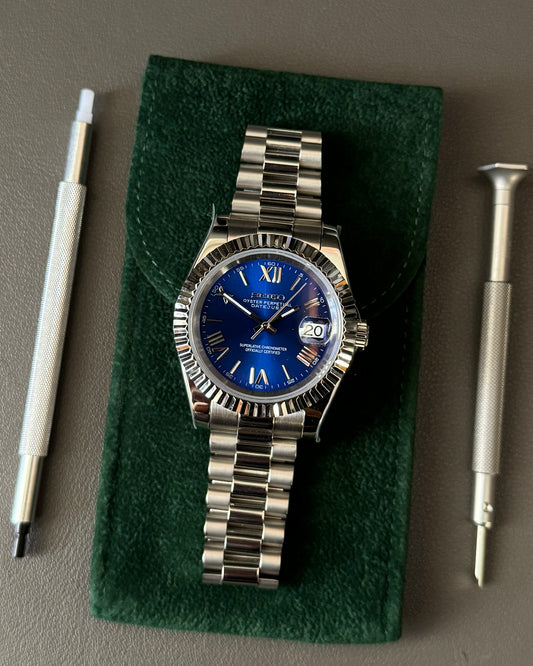 DateJust: Stainless Steel Blue Dial Roman Markers w/ Presidential Bracelet