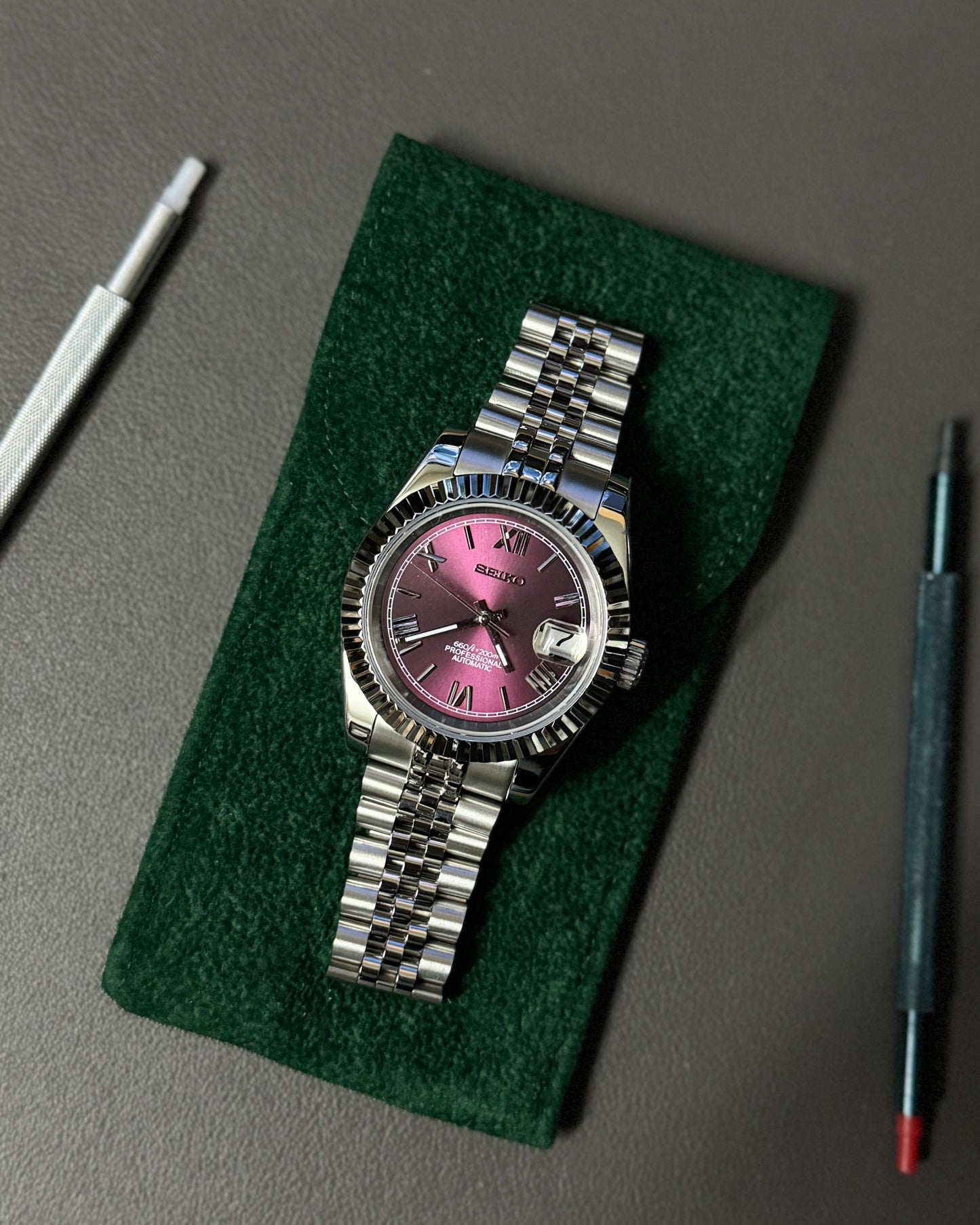 Seiko Mod DateJust: Stainless Steel Sunburst Cherry Dial Roman Numeral Markers w/ Jubilee Bracelet