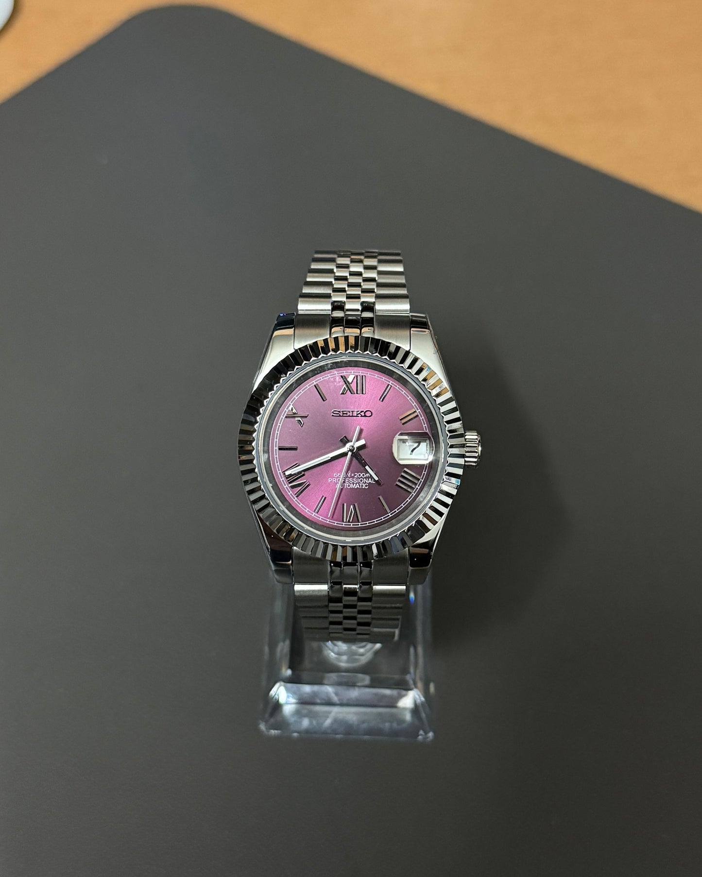 Seiko Mod DateJust: Stainless Steel Sunburst Cherry Dial Roman Numeral Markers w/ Jubilee Bracelet