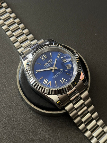 DateJust: Stainless Steel Blue Dial Roman Markers w/ Presidential Bracelet