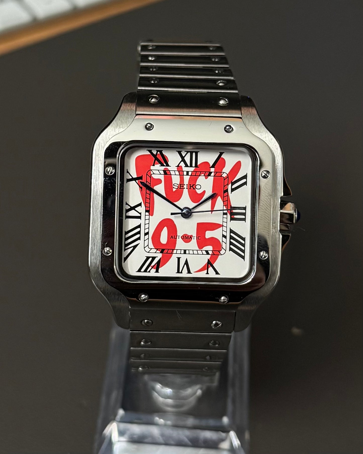 Santos: Stainless Steel White “Fuck 9-5” Dial Roman Markers