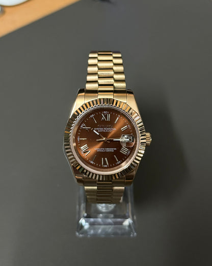 DateJust: Rose Gold Chocolate Dial Roman Numerals Fluted Bezel on Presidential Bracelet